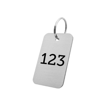 Llavero de aluminio rectangular con  numeracion 30x50mm- Por unidad