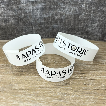 Pulseras de Tyrex personalizadas con tu texto - por 100 unidades