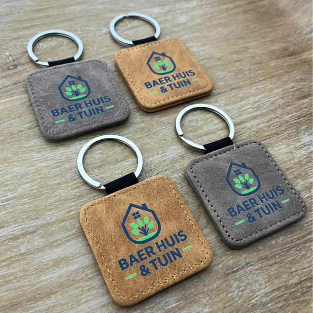 Llavero de cuero gris con tu logotipo 50×50mm – Por unidad
